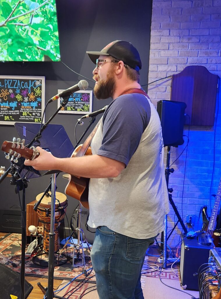 pizza cafe open mic night